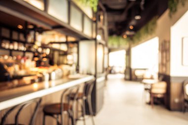 Arka plan için soyut bulanık kahve dükkanı iç mimarisi