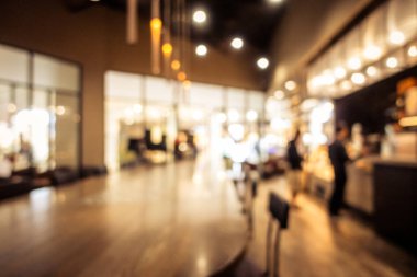 Arka plan için soyut bulanık kahve dükkanı iç mimarisi