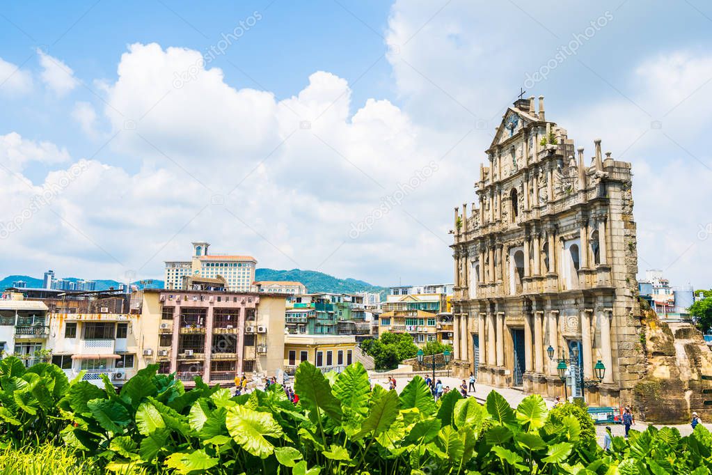 Beautiful old architecture building with ruin of st pual church landmark of macau city with blue sky background