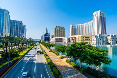 Beautiful architecture building of venetian and other hotel resort and casino in macau city at night clipart