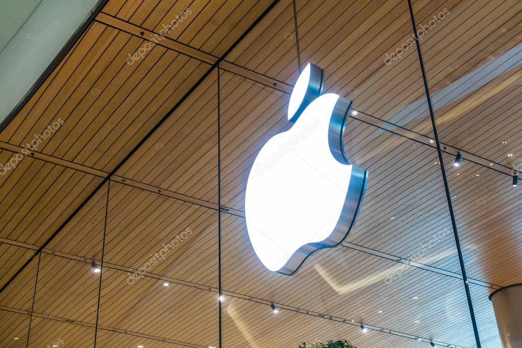 Bangkok, Thailand 28 December 2018 : Apple logo on the window glass at Icon siam department store