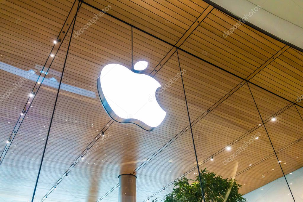 Bangkok, Thailand 28 December 2018 : Apple logo on the window glass at Icon siam department store