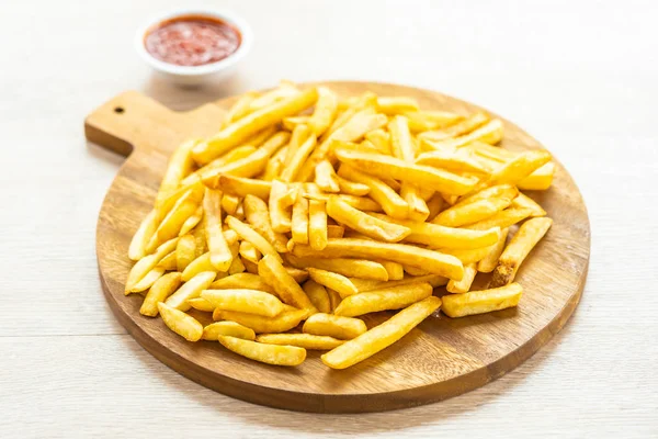 French fries with tomato or ketchup sauce — Stock Photo, Image