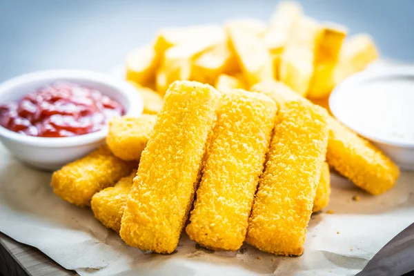 Fish finger and french fries or chips with tomato ketchup and ma — Stock Photo, Image