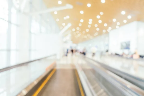 Abstrato borrão e terminal de passageiros do aeroporto desfocado para trans — Fotografia de Stock