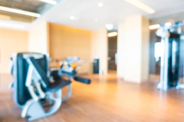 Abstract blur and defocused fitness equipment in gym interior