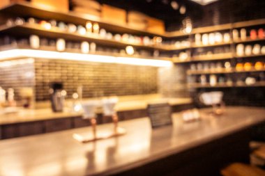 Arka plan için soyut bulanık kahve dükkanı iç mimarisi