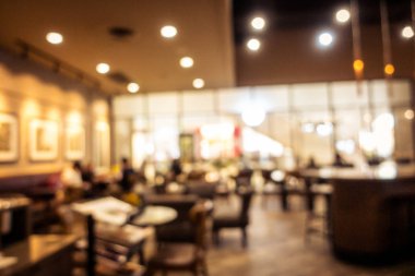 Arka plan için soyut bulanık kahve dükkanı iç mimarisi