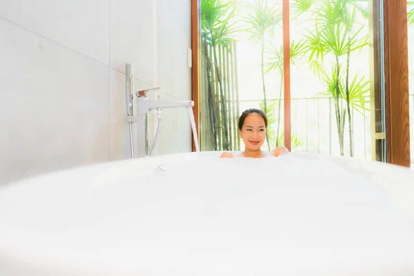 blonde asian in bath