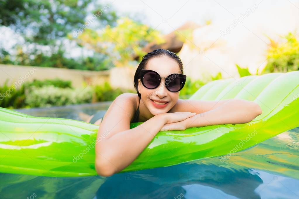 Portrait beautiful young asian woman smile happy relax and leisu