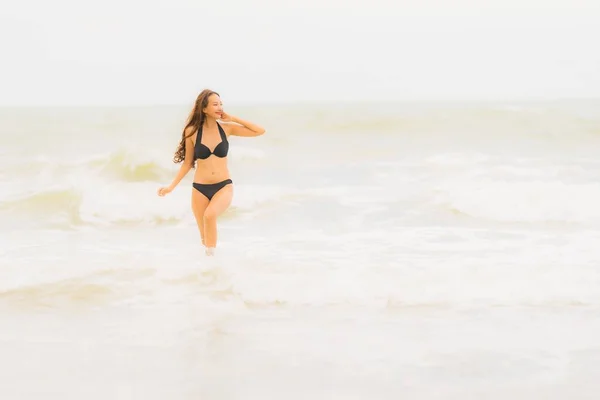 Portrait beautiful young asian woman wear bikini on the beach se — Stock Photo, Image