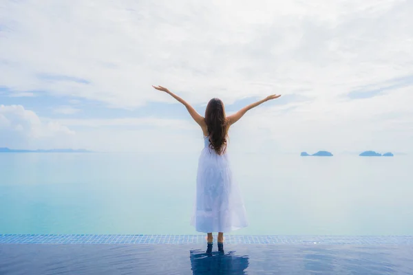 Portrait young asian woman relax smile happy around swimming poo — Stock Photo, Image