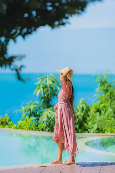 Portrait young asian woman relax smile happy around outdoor swim — Stock Photo, Image