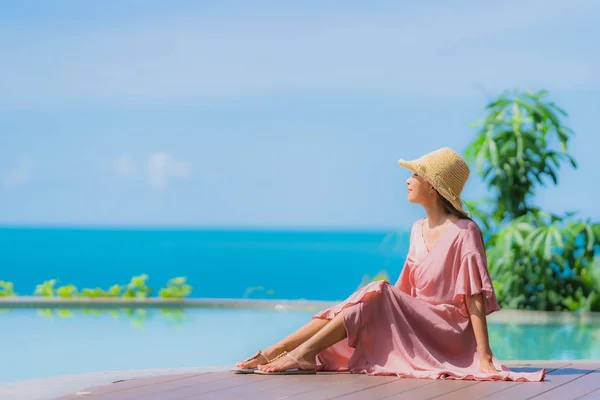 Portrait young asian woman relax smile happy around outdoor swim — Stock Photo, Image