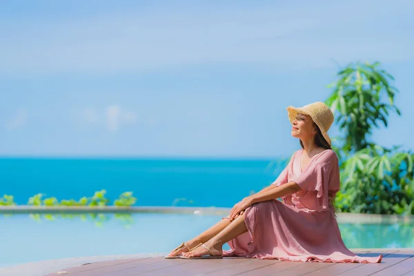 Portrait young asian woman relax smile happy around outdoor swim — Stock Photo, Image