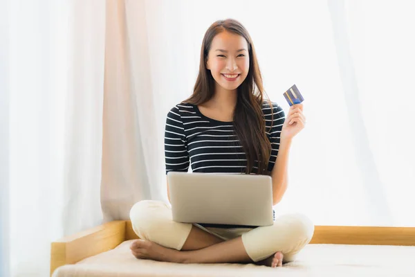 Portrait beautiful young asian woman using computer notebook or — Stock Photo, Image