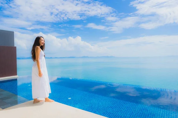 Portrait young asian woman relax smile happy around swimming poo — Stock Photo, Image