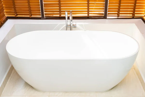 Beautiful luxury and comfortable white bathtub decoration in bat Royalty Free Stock Images