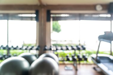 Soyut bulanıklık ve spor salonu iç fitness ekipmanları bulanıklaştırma