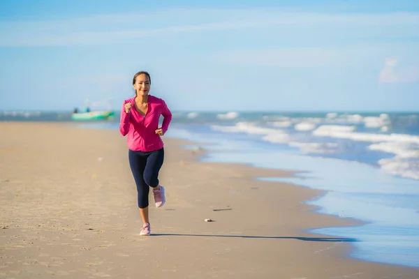 Portrait beautiful young asian woman running and exercising on t — Stock Photo, Image