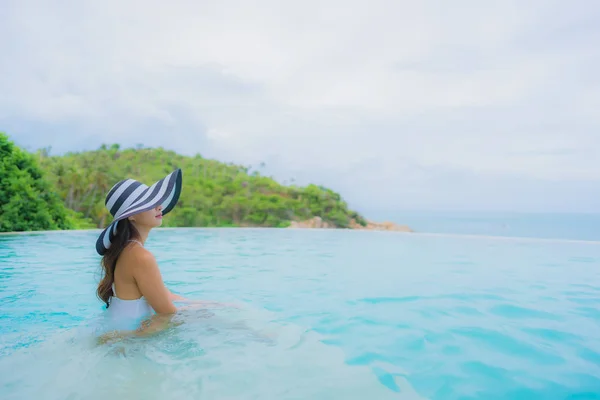 Portrait young asian woman relax smile happy around outdoor swim — Stock Photo, Image