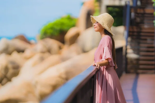 Portrait beautiful young asian woman looking sea beach ocean for — Stock Photo, Image