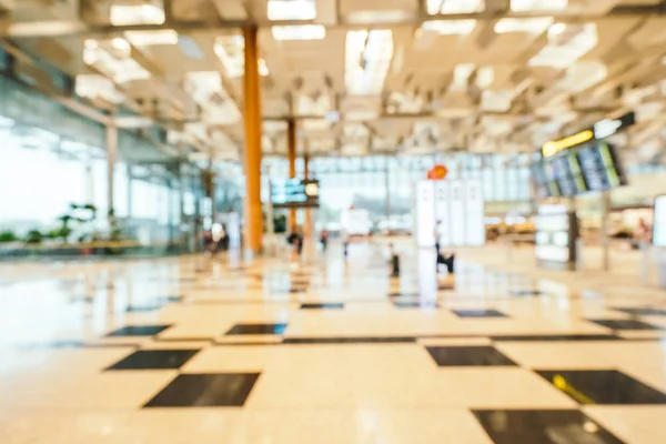 抽象的なぼかしと多重チャンギ空港ターミナル内部 — ストック写真