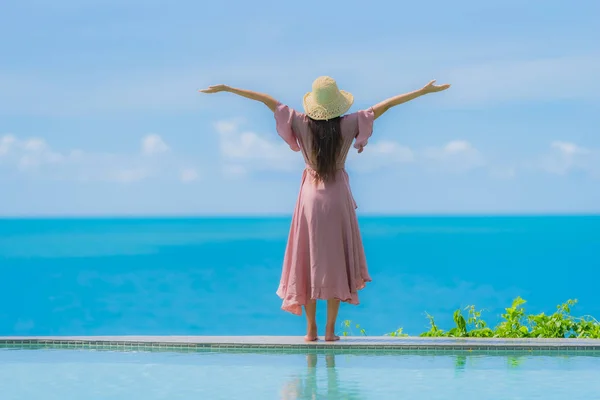 Portrait young asian woman relax smile happy around outdoor swim — Stock Photo, Image