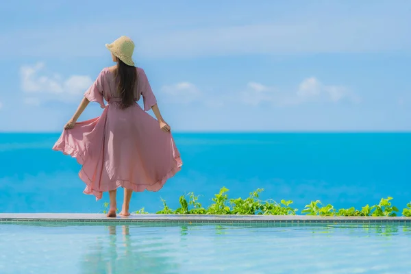 Portrait young asian woman relax smile happy around outdoor swim — Stock Photo, Image