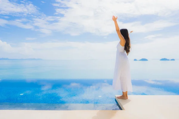 Portrait young asian woman relax smile happy around swimming poo — Stock Photo, Image