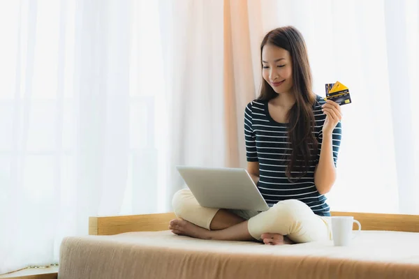 Portrait beautiful young asian woman using computer notebook or — Stock Photo, Image