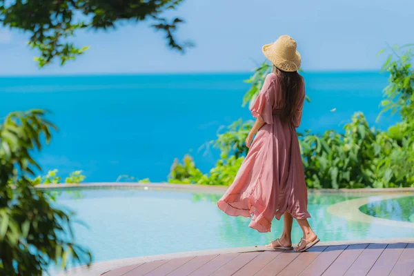 Portrait young asian woman relax smile happy around outdoor swim — Stock Photo, Image