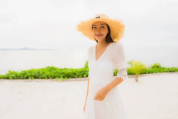 Portrait beautiful asian woman wear hat with smile happy leisure