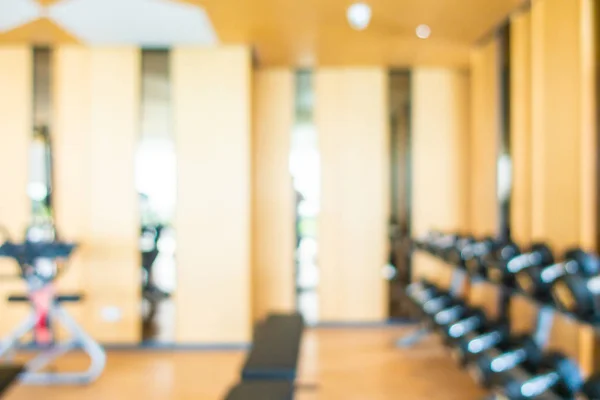 Matériel de fitness abstrait flou et déconcentré à l'intérieur de la salle de gym — Photo