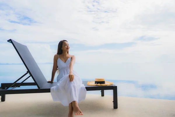 Portrait young asian woman relax smile happy around swimming poo — Stock Photo, Image