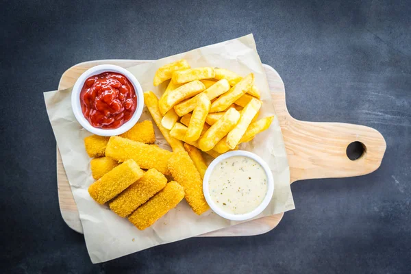 Fish finger and french fries or chips with tomato ketchup and ma — Stock Photo, Image
