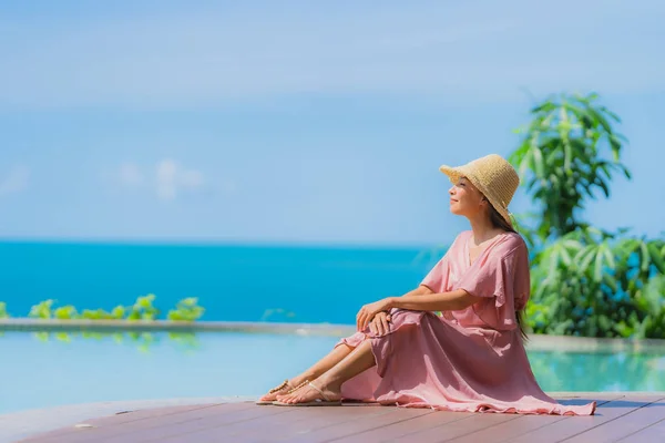 Portrait young asian woman relax smile happy around outdoor swim — Stock Photo, Image