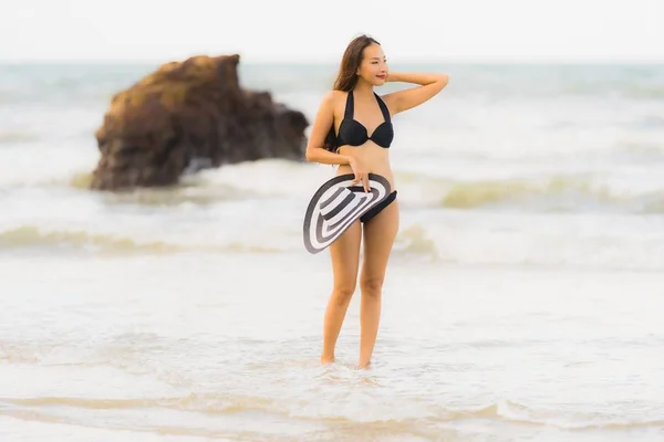 Portrait beautiful young asian woman wear bikini on the beach se — Stock Photo, Image