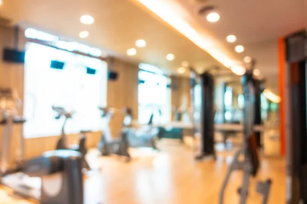 Abstract Blur en Defocus fitnessapparatuur in Gym kamer interieur — Stockfoto