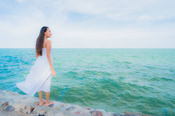 Portrait beautiful asian women around beach sea ocean with happy