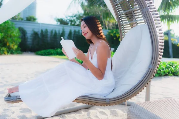 Portrait beautiful asian woman reading book around beach sea oce — Stock Photo, Image