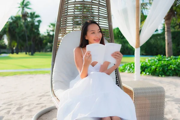 Portrait beautiful asian woman reading book around beach sea oce — Stock Photo, Image