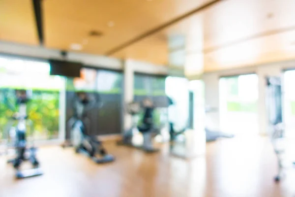 Abstract Blur en Defocus fitnessapparatuur in Gym interieur — Stockfoto