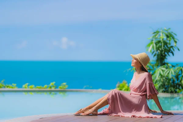 Portrait young asian woman relax smile happy around outdoor swim — Stock Photo, Image