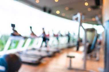 Soyut bulanıklık ve spor salonu iç fitness ekipmanları bulanıklaştırma