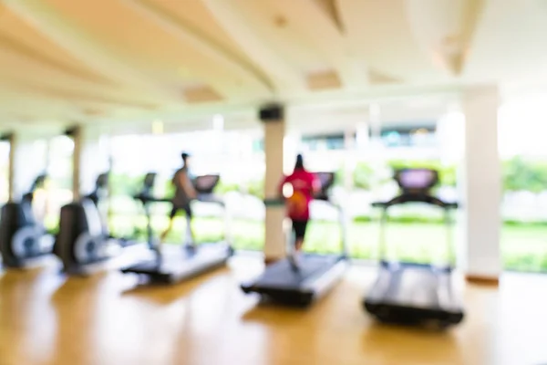 Abstract Blur en defocused fitnessapparatuur in Gym interieur ro — Stockfoto