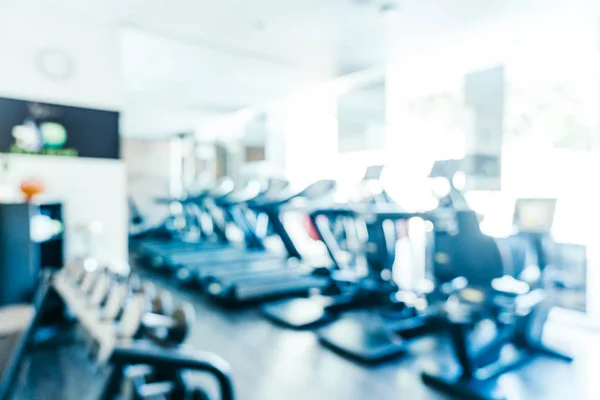 Abstrakte Unschärfen von Fitnessgeräten im Fitnessstudio-Innenraum — Stockfoto