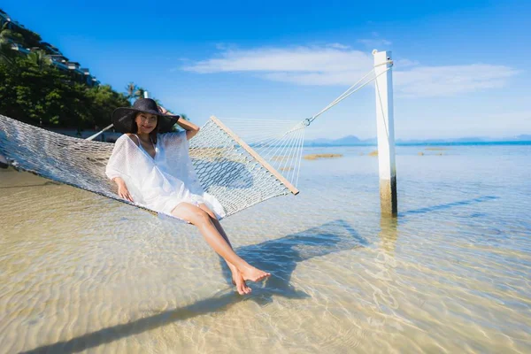 Portrait beautiful young asian woman sitting on hammock around s — Stock Photo, Image