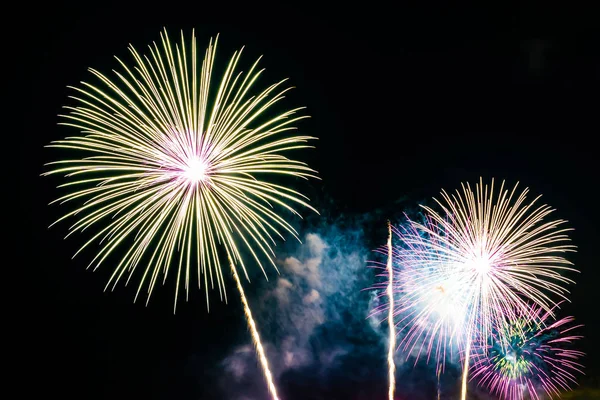 stock image Beautiful firework display on sky at night for celebration