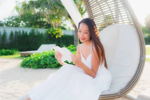 Portrait beautiful asian woman reading book around beach sea oce — Stock Photo, Image